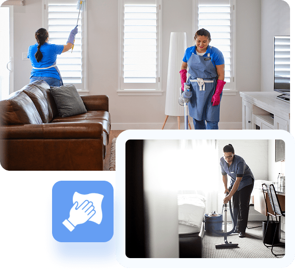 Two people cleaning a bright living room together.